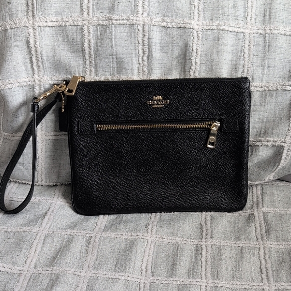 Coach Handbags - Coach Black Leather Wristlet with Gold Accents